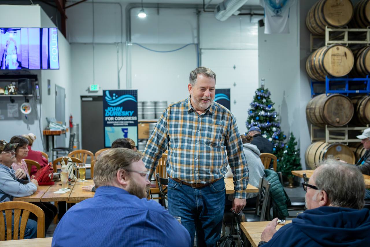 John talking with constituents
